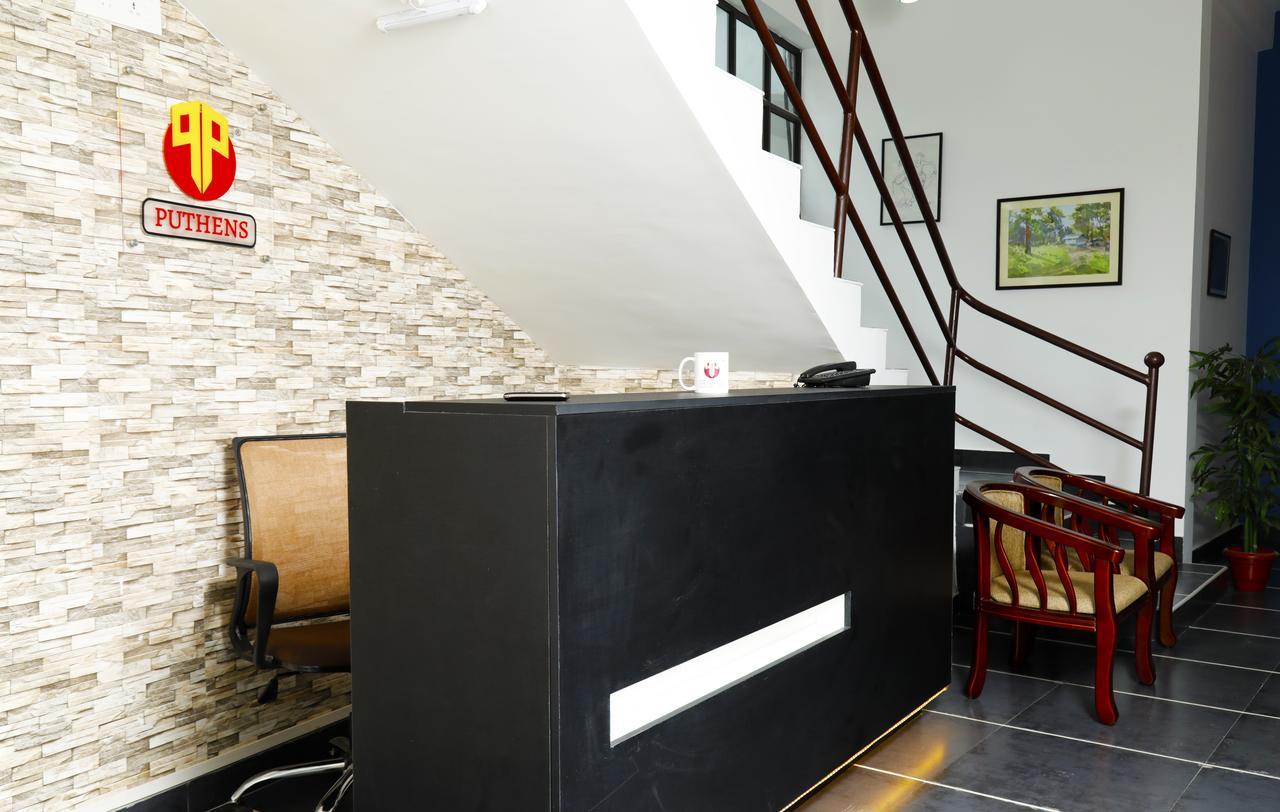 Puthens Clifton Inn Коттаям Екстер'єр фото