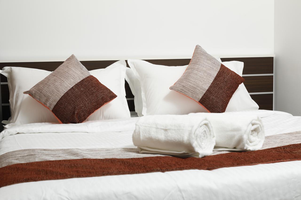 Puthens Clifton Inn Коттаям Екстер'єр фото